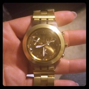 Gold swatch watch